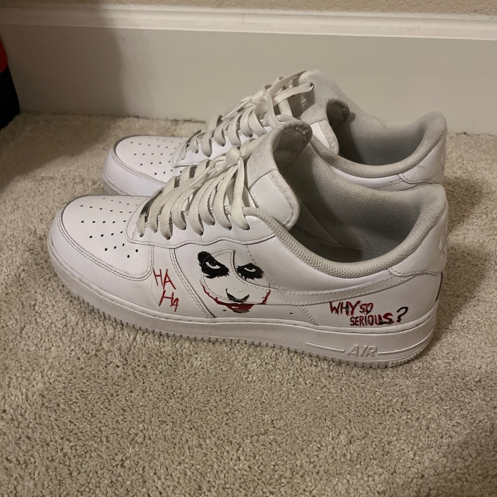 Nike Men’s White Sneakers with Red and Black Joker Graphic
